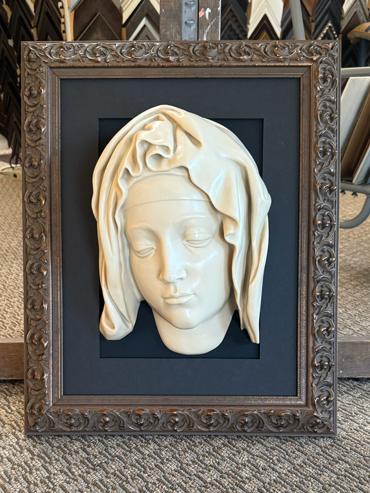 Custom framing of three-dimensional objects and statuary.